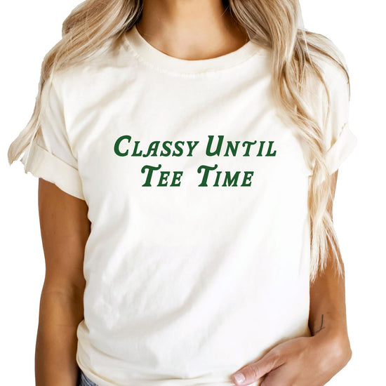 Front view of Classy Until Tee Time women's golf t-shirt in vintage green with white graphic lettering