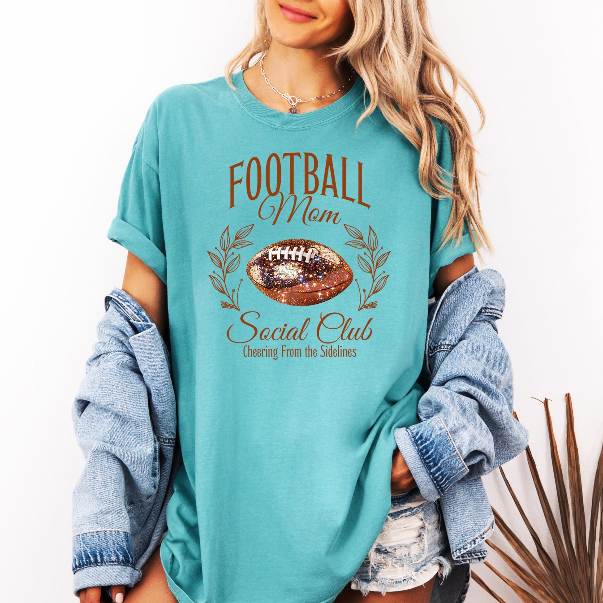 Detail shot of faux glitter print quality on Football Mom Social Club women's tee