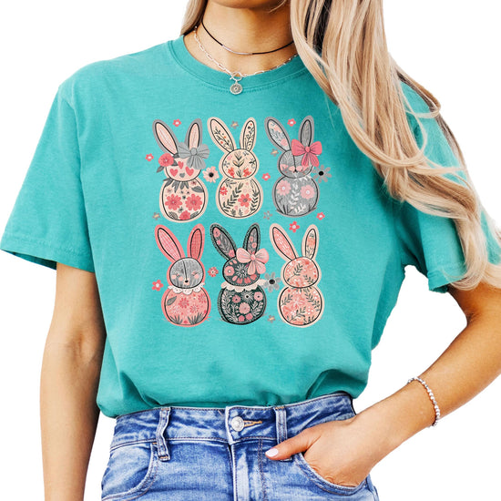Woman wearing ivory retro floral bunny Easter tee, casual spring style with coquette aesthetic