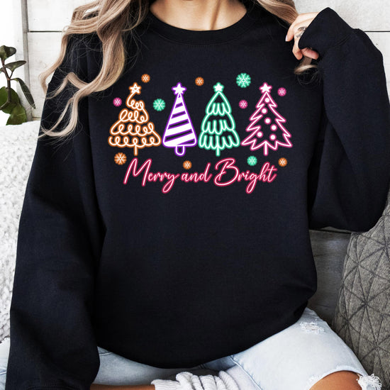 Festive black Christmas pullover sweatshirt with electric neon tree print for women and teens