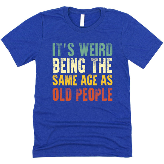Detail shot of high-quality screen print on dark gray men's humor graphic tee