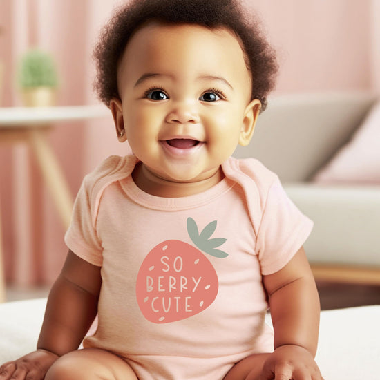 So Berry Cute baby bodysuit displayed to show fit and snap closure at bottom