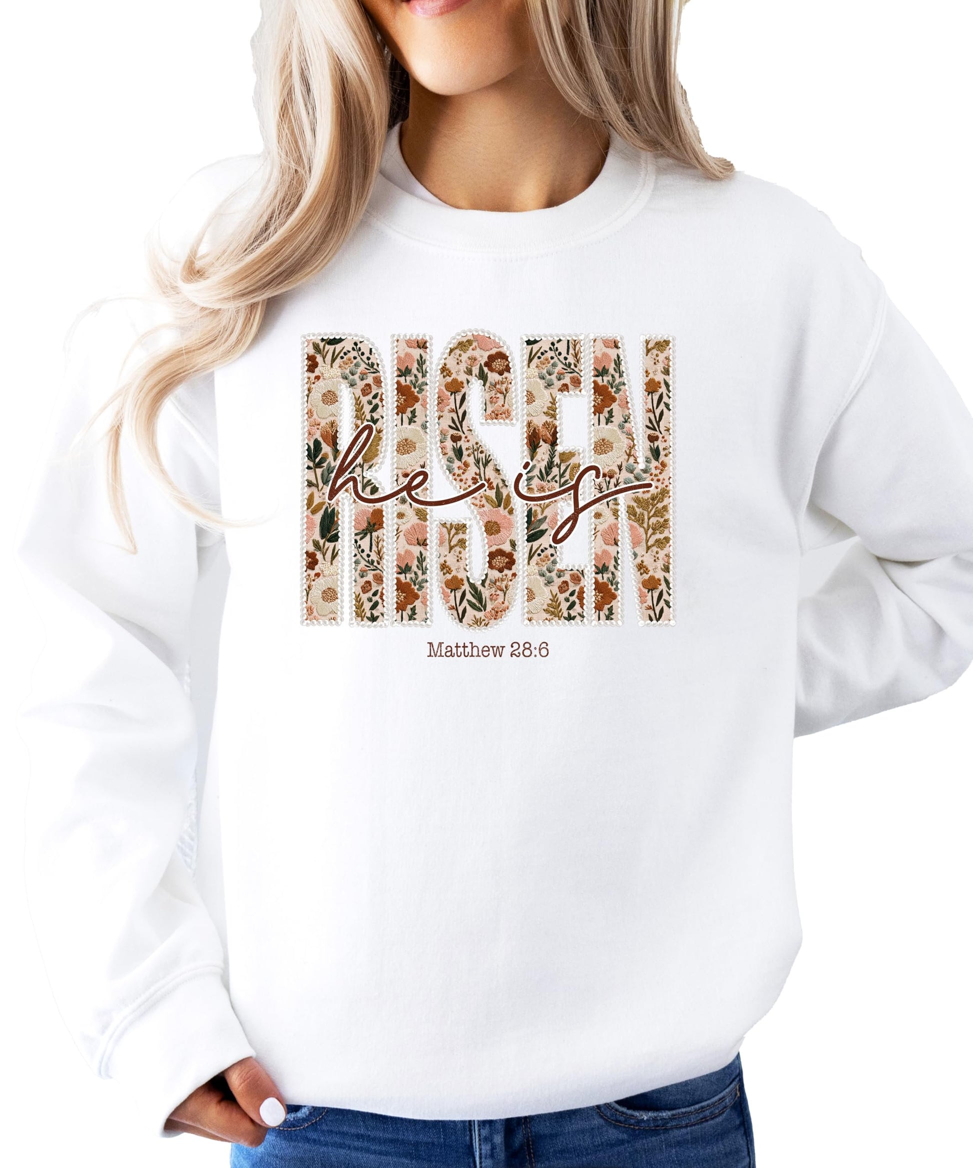 Lifestyle photo of woman wearing He Is Risen floral Christian sweatshirt in army green