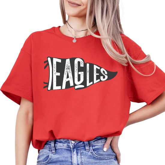 Vintage green Eagles flag school pride t-shirt worn by woman