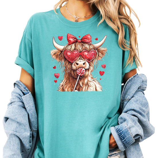 Woman wearing ivory Highland Cow Valentine's shirt with sweet farm animal design