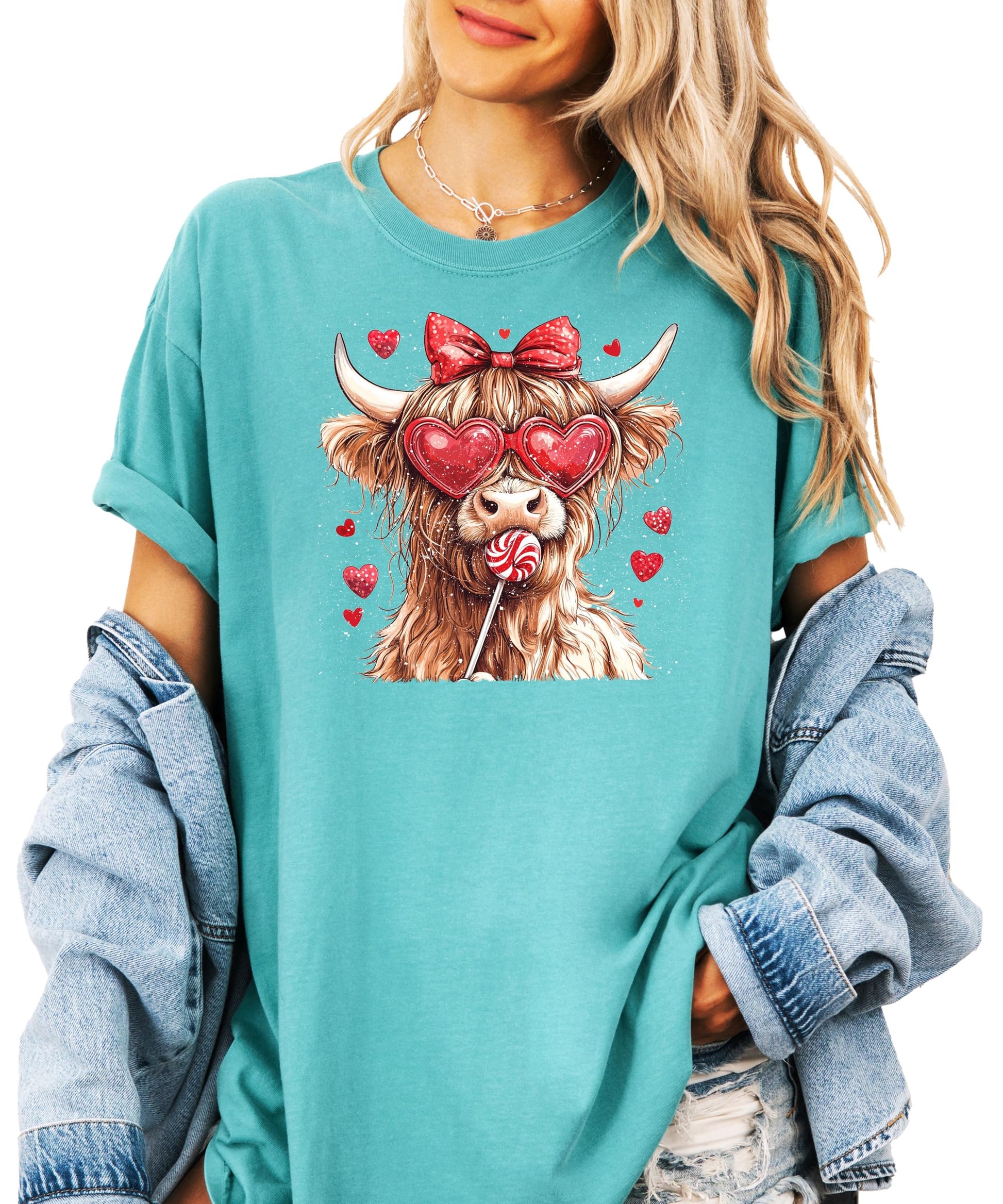 Woman wearing ivory Highland Cow Valentine's shirt with sweet farm animal design
