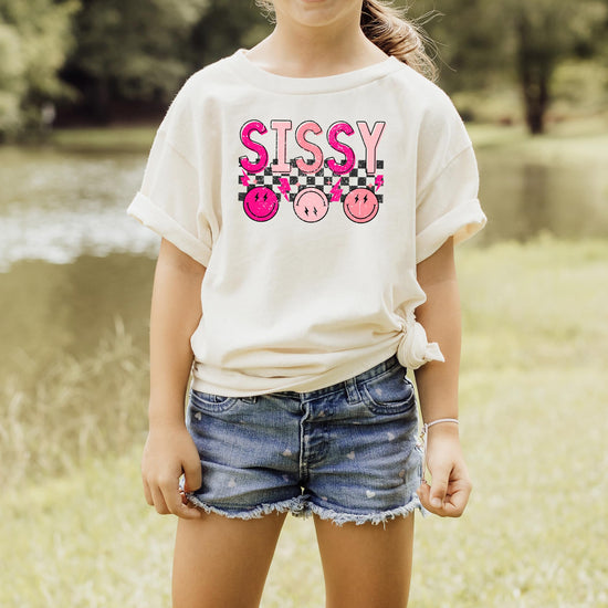 Girls wearing matching sibling Sissy graphic tee in pink retro design