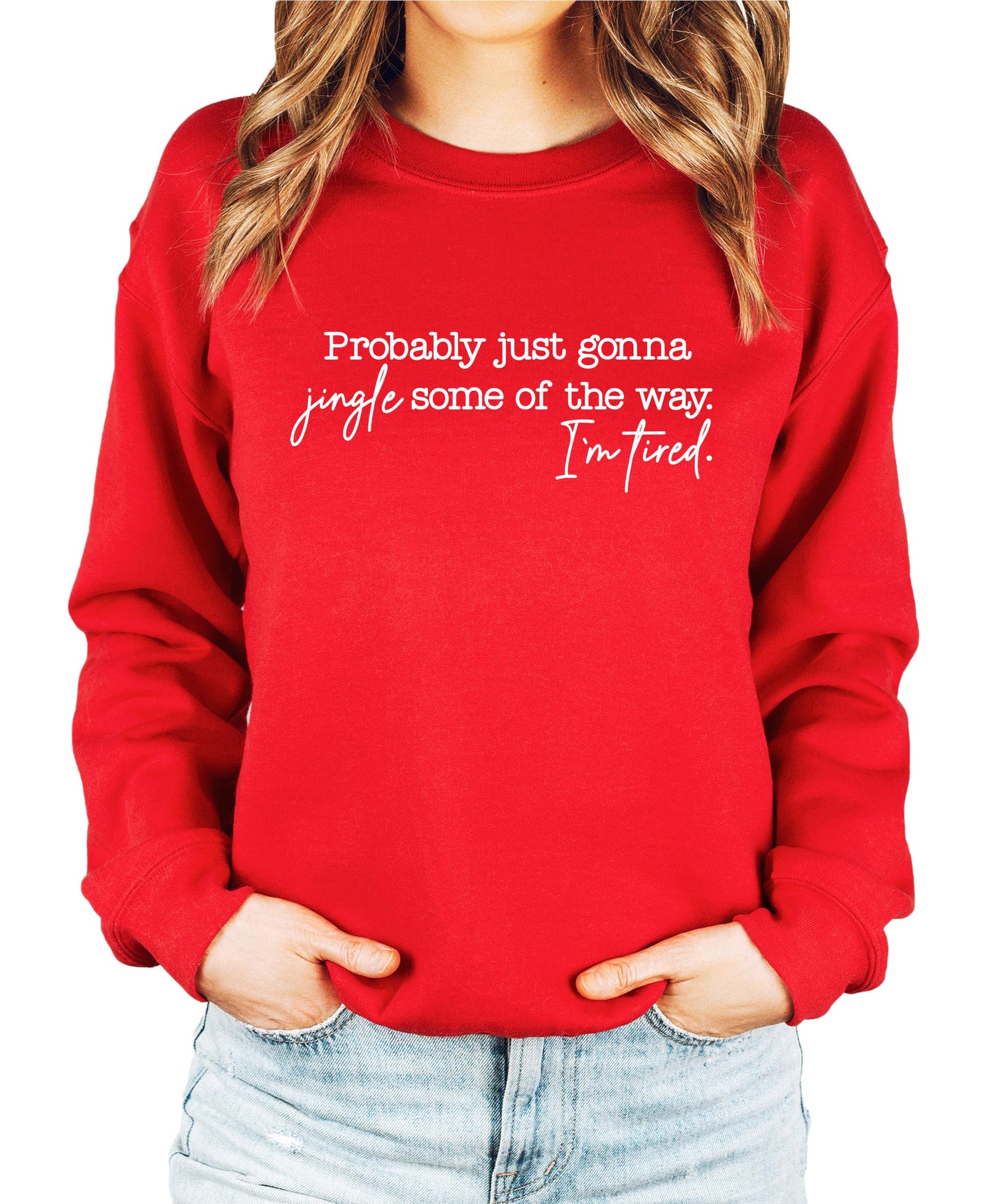 Close-up of Jingle Some of the Way I'm Tired graphic print on a red holiday sweatshirt