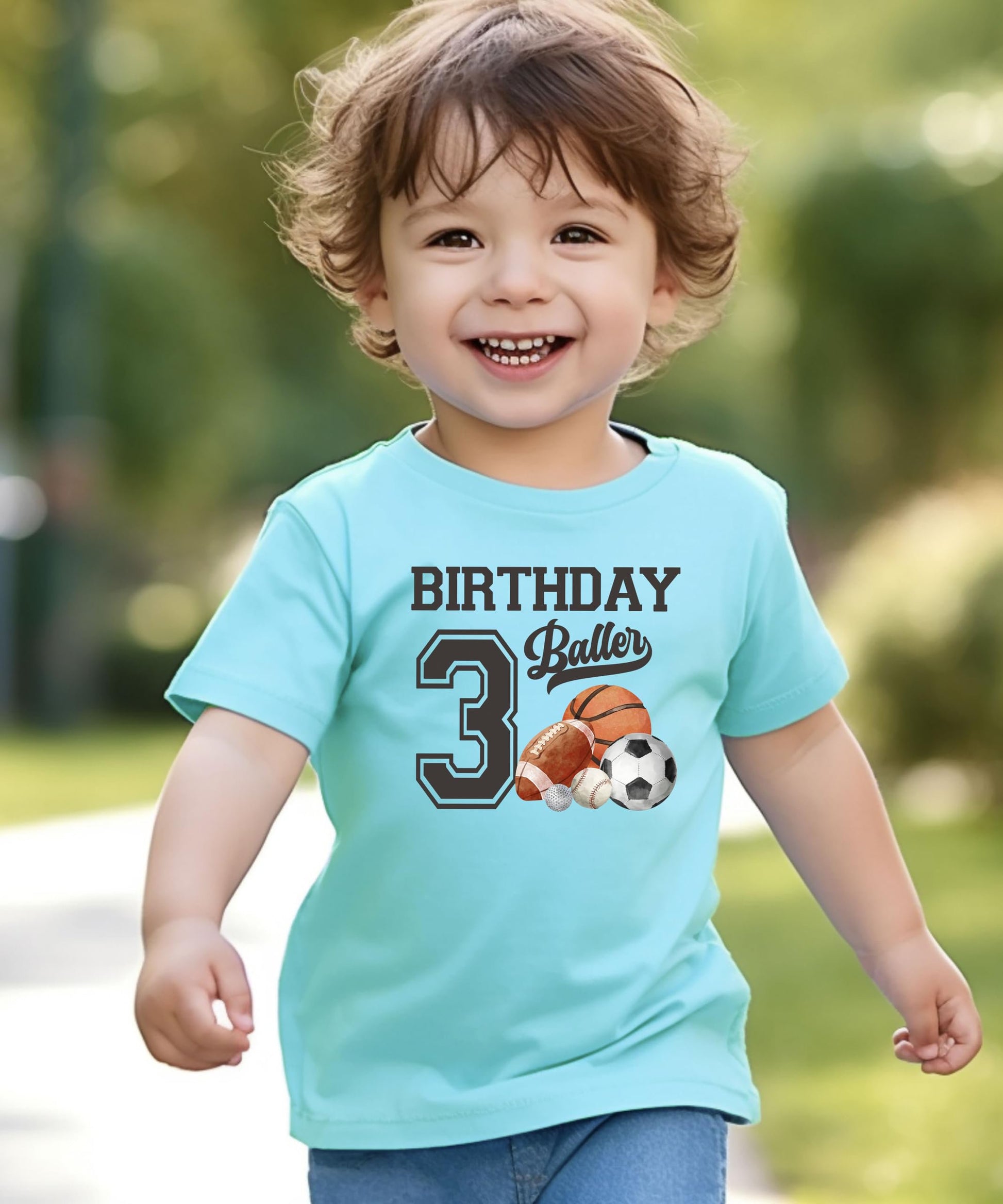 Detail shot of professional USA-printed Birthday Baller graphic on boys toddler tee