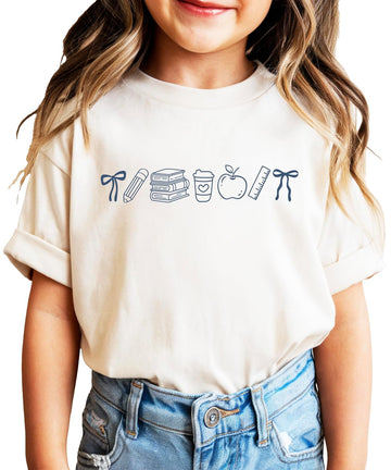 Pink coquette bow back to school graphic tee featuring hand-drawn school supplies including books, pencil, apple, and ruler