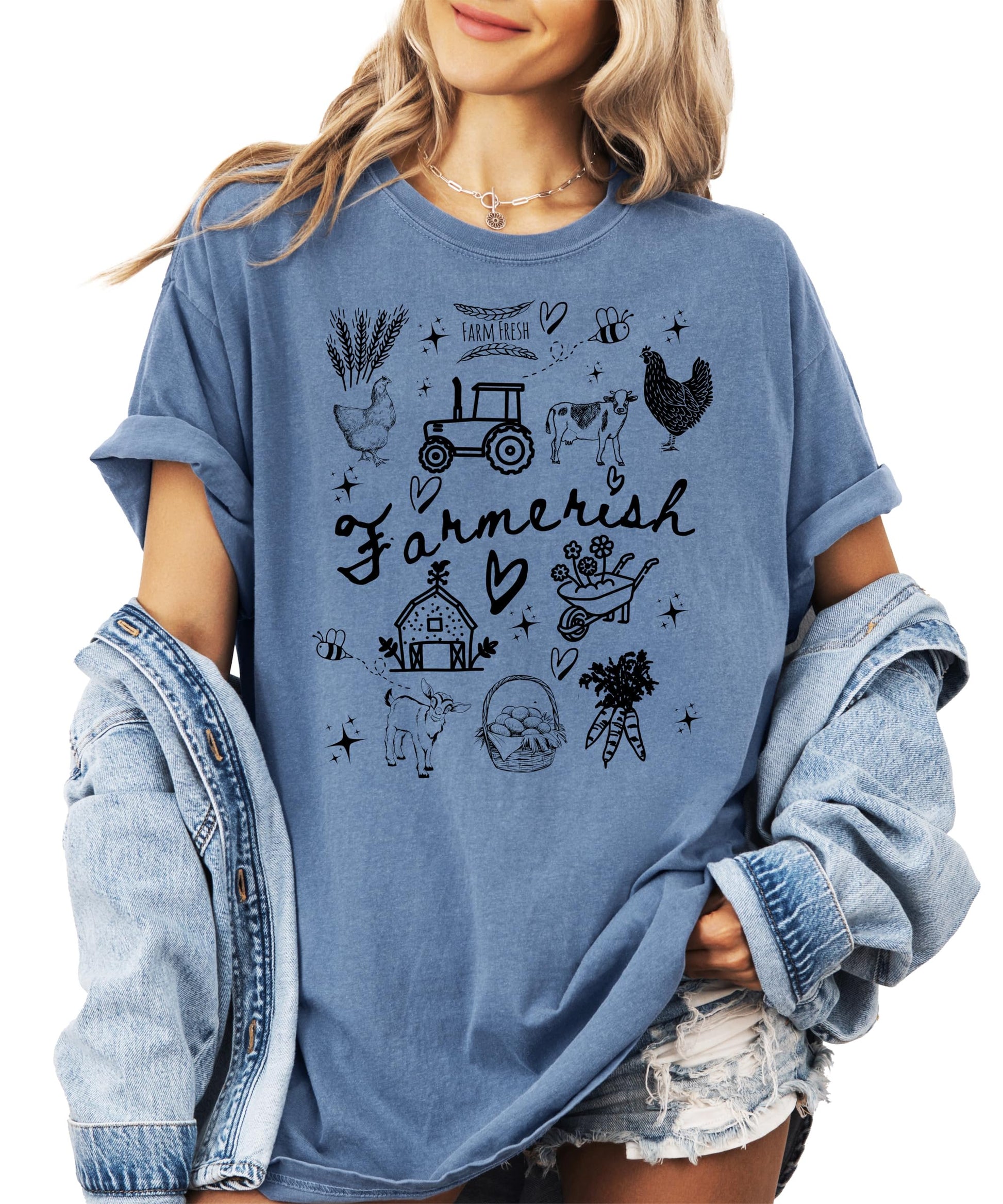 Close-up of hand-drawn farm theme graphic print on a soft women's t-shirt
