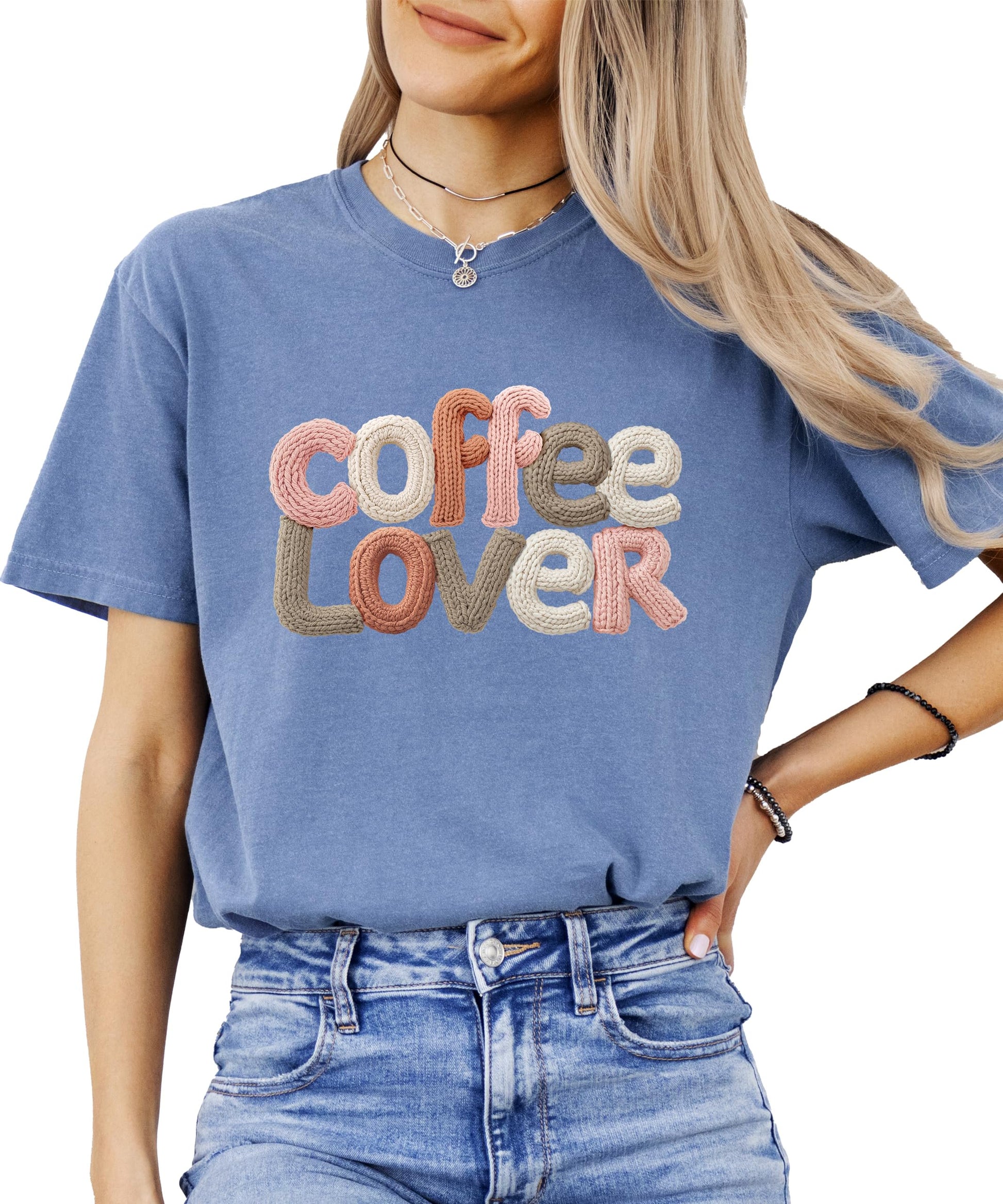 Detail shot of faux yarn-patch coffee lover print on women's graphic tee