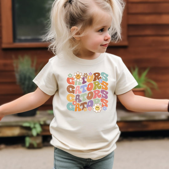 Side or lifestyle view of Gators groovy colorful sports graphic tee for women and kids
