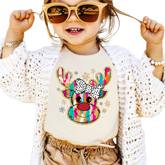 Side or back view of kids' pink holiday reindeer tee showing fit and fabric quality