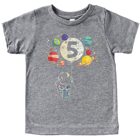 Kids 5th birthday astronaut rocket space themed graphic t-shirt with moon balloon and planets in vintage royal blue