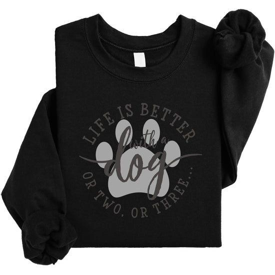 Flat lay of white women's crewneck sweatshirt with funny dog quote graphic