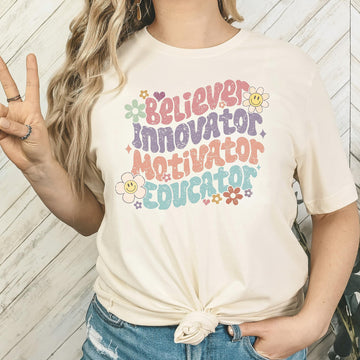 Close-up of teacher life graphic print on natural colored women's shirt