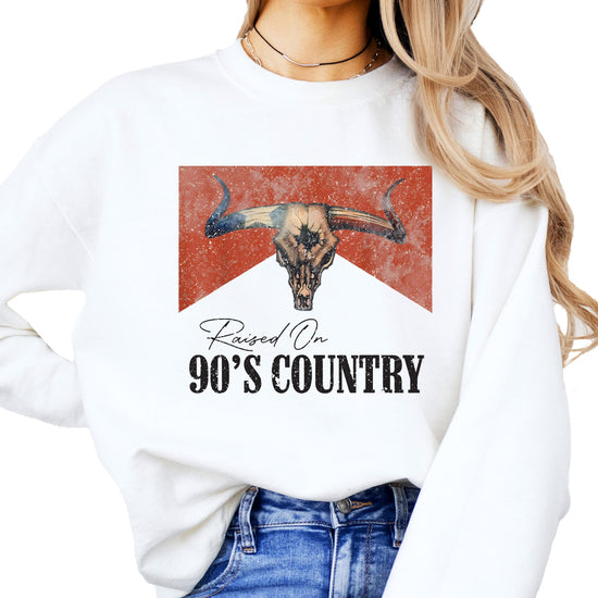 Lifestyle shot of person wearing Raised On 90s Country vintage western sweatshirt