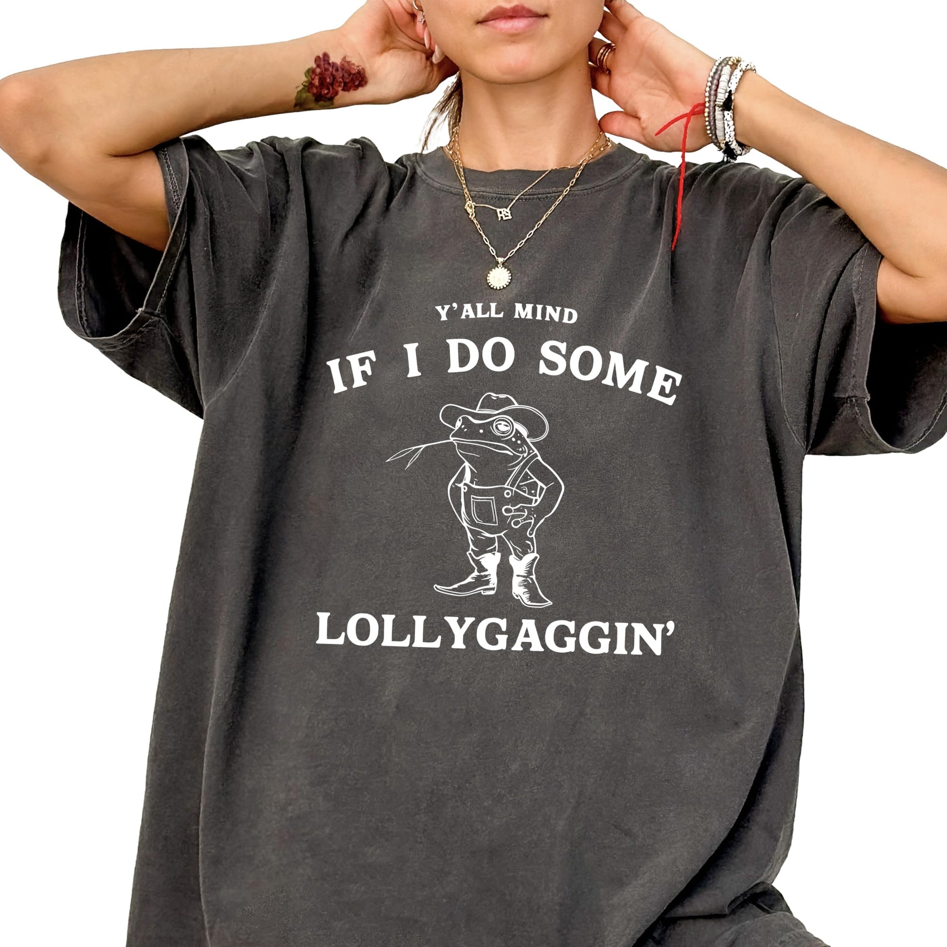 Lifestyle shot of woman wearing seafoam lollygaggin toad graphic tee