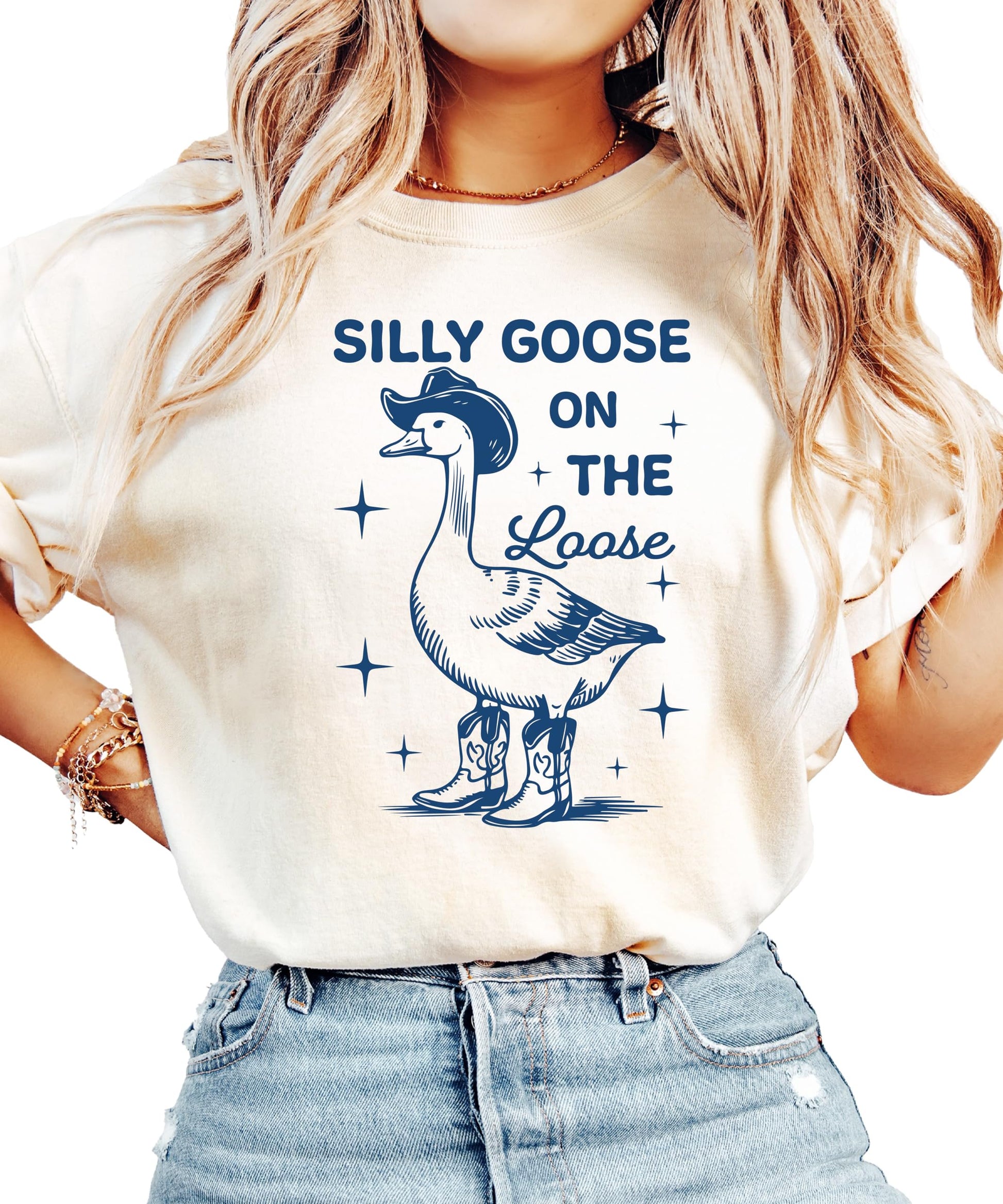 Close-up of Silly Goose on the Loose graphic print design on ivory shirt