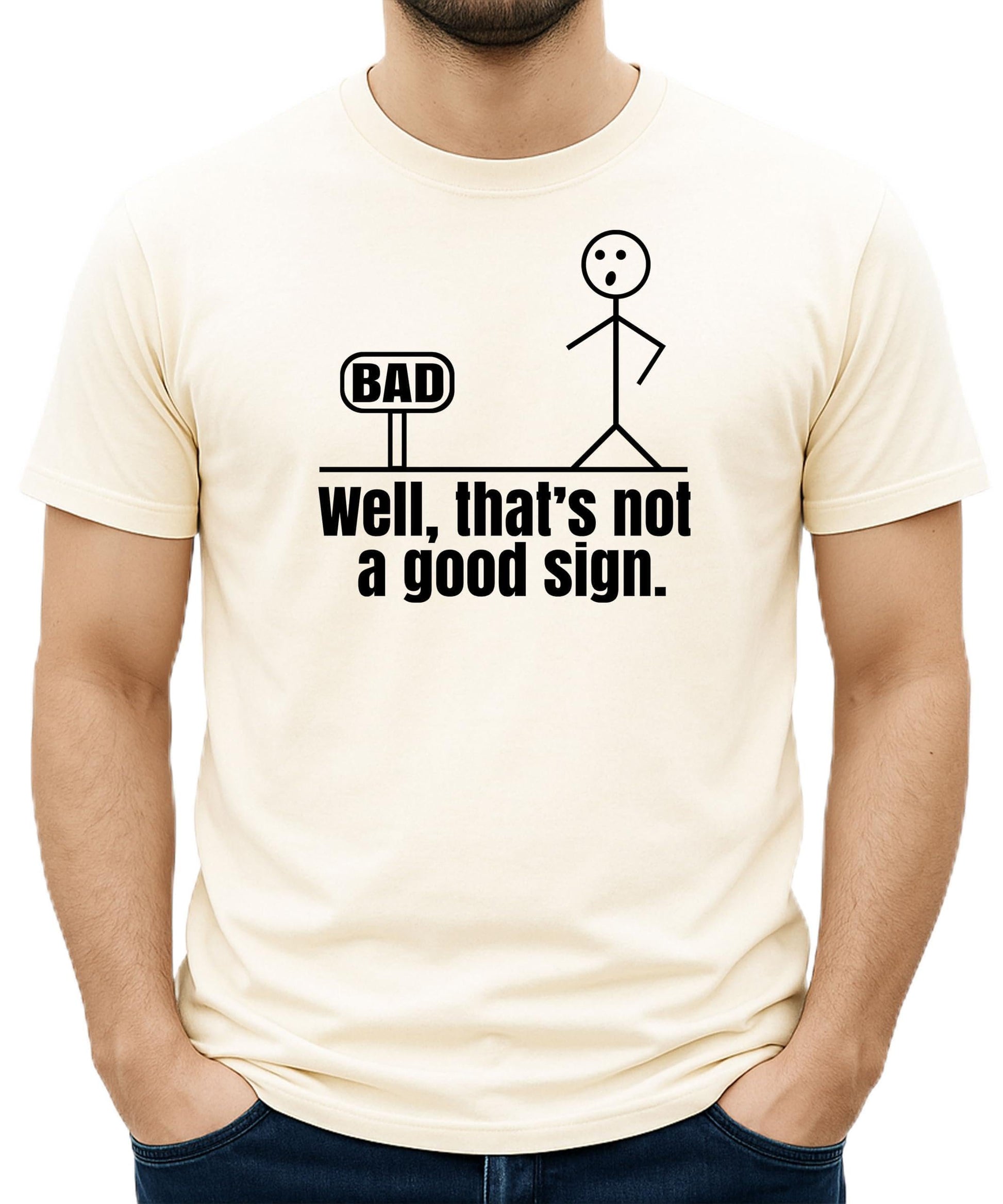 Close-up view of stick figure bad sign humor graphic print on men's t-shirt