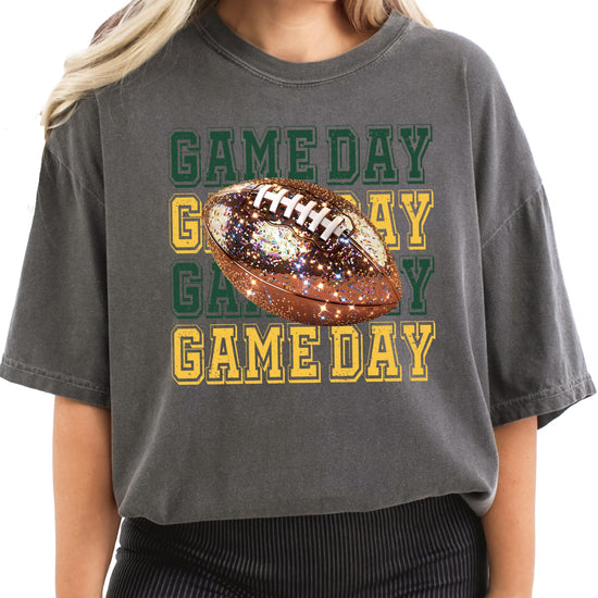 Women's ivory game day tee with bold green and yellow faux glitter football graphic