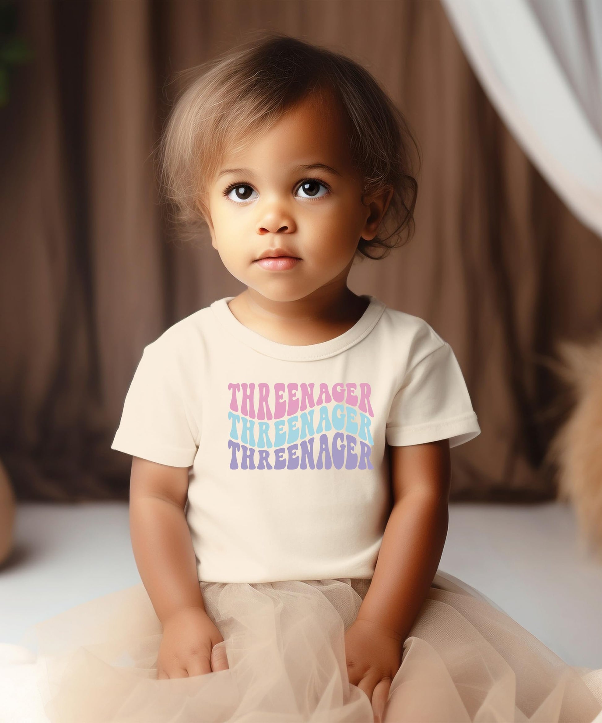 Flat lay of natural color groovy Threenager toddler birthday shirt showing full graphic