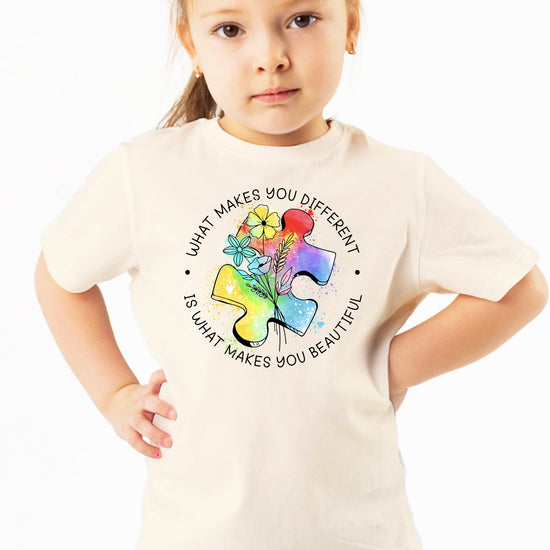 Full front view of autism awareness t-shirt showing complete design and message
