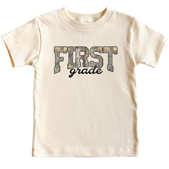 Boy wearing First Grade camouflage shirt — back to school outfit in natural colorway