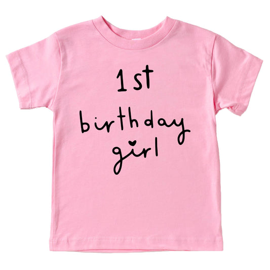 Close-up of retro heart birthday girl graphic print on peach toddler tee by Olive Loves Apple