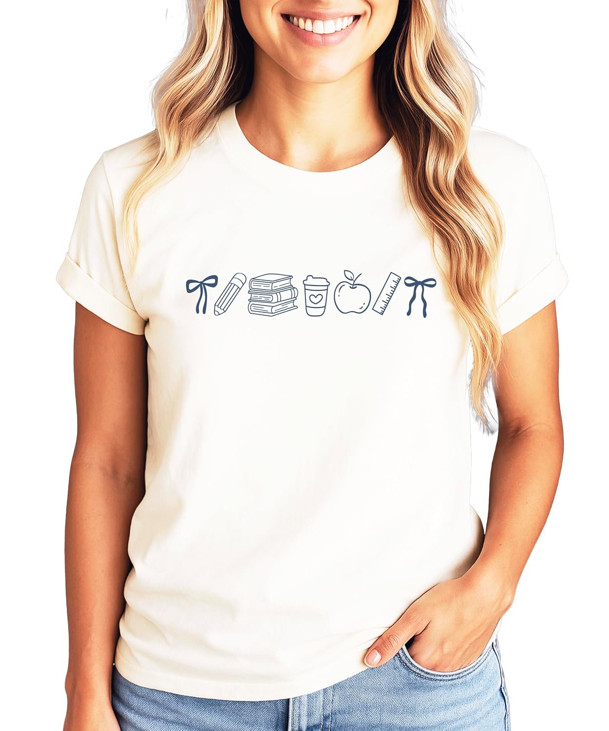 Front view of pink school supplies graphic tee with coquette bow design, shown on adult female model