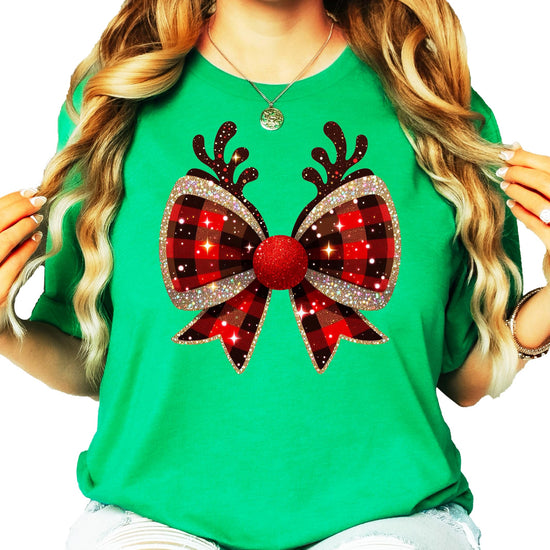 Close-up of buffalo check bow and reindeer antlers graphic print on Christmas holiday shirt