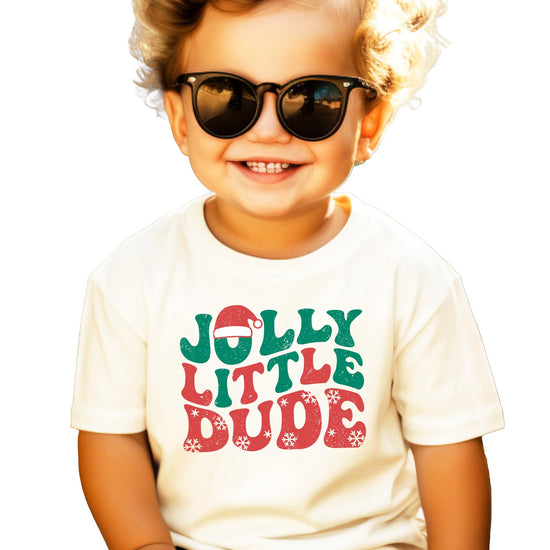 Jolly Little Dude kids Christmas graphic tee with red and green snowflake design on black shirt