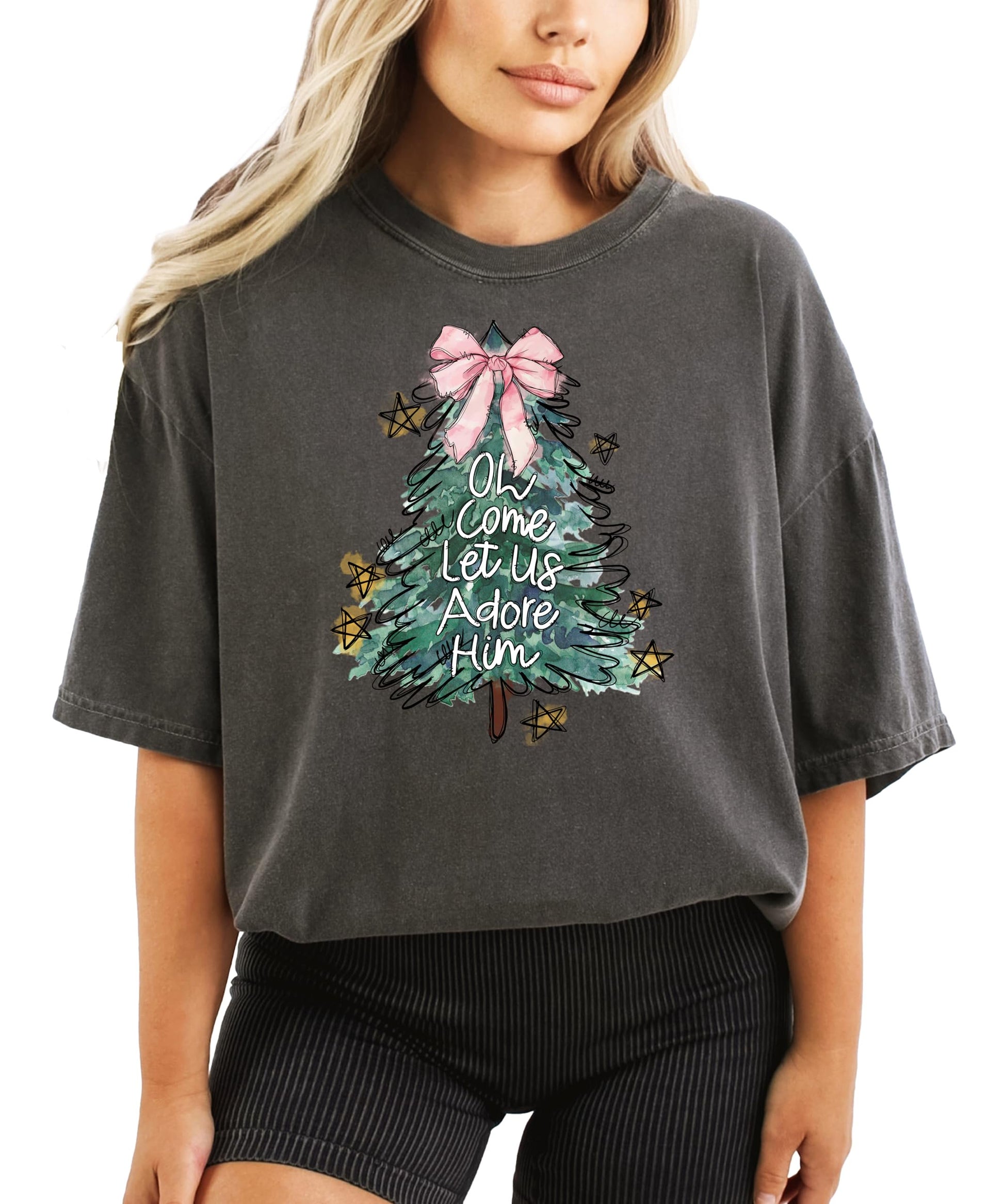 Women's seafoam Christmas graphic tee with religious holiday message and festive tree design