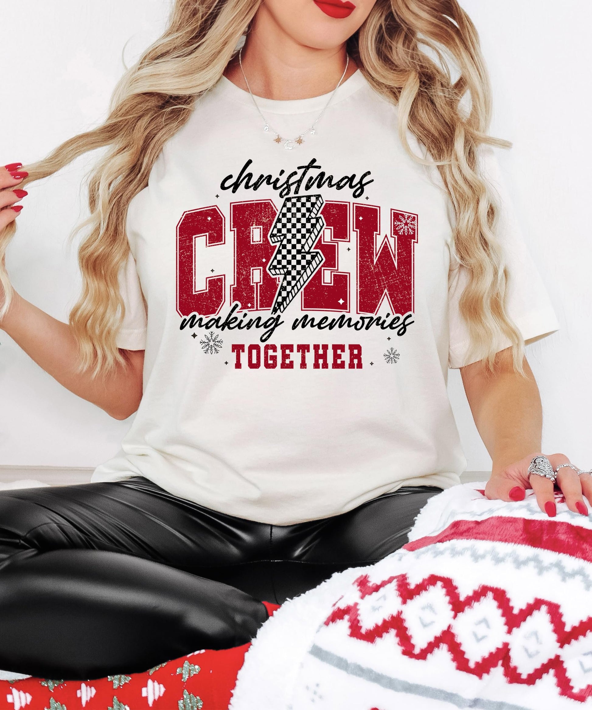 Front view of Christmas Crew 2024 holiday graphic tee featuring trendy checkered design on natural shirt