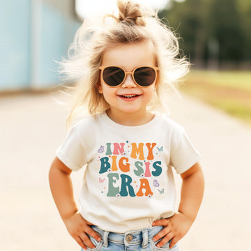 Back or detail view of In My Big Sis Era big sister shirt for girls by Olive Loves Apple