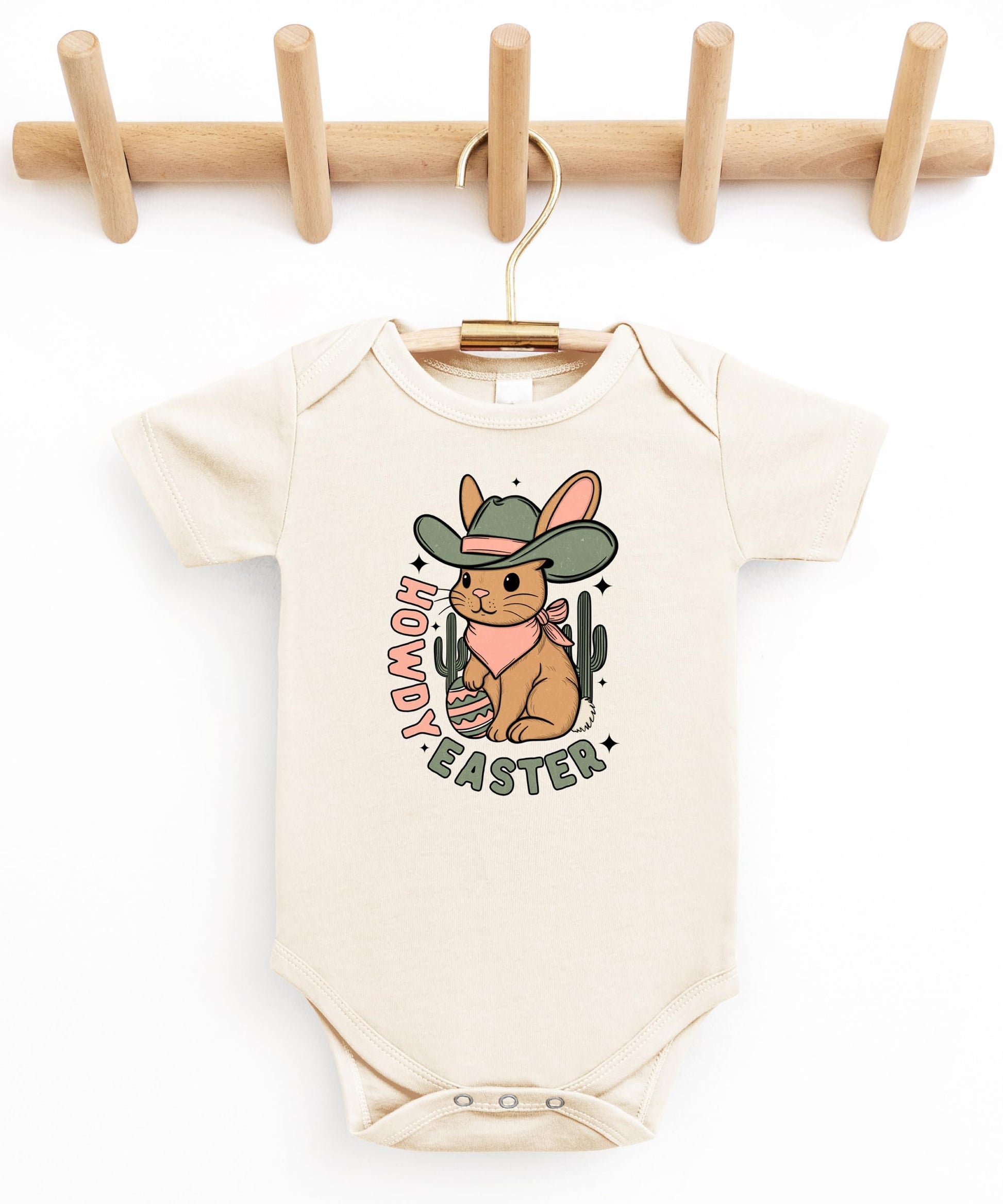 Detail shot of professional print quality on howdy bunny baby girl one-piece