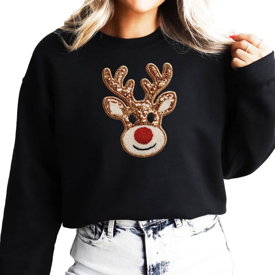 Youth and women's black reindeer sweatshirt styled for Christmas season