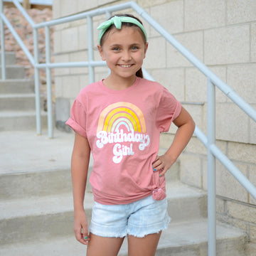 Side view of retro rainbow birthday girl shirt showing fit and design