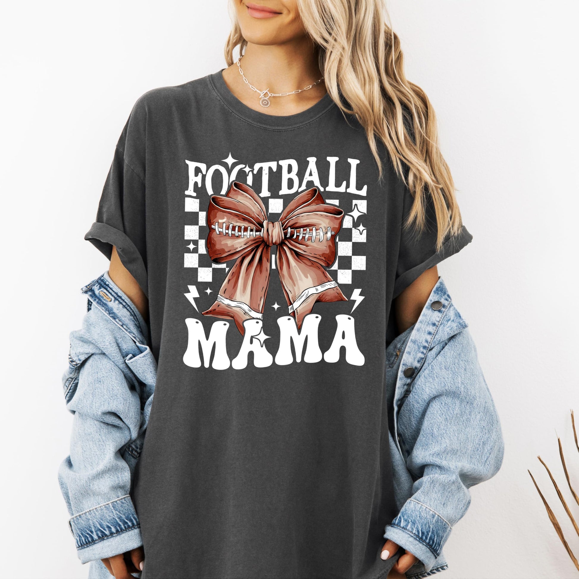 Back view of ivory Football Mama graphic tee by Olive Loves Apple