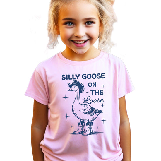 Close-up of cowboy goose graphic print on kids tee showing boots and hat details