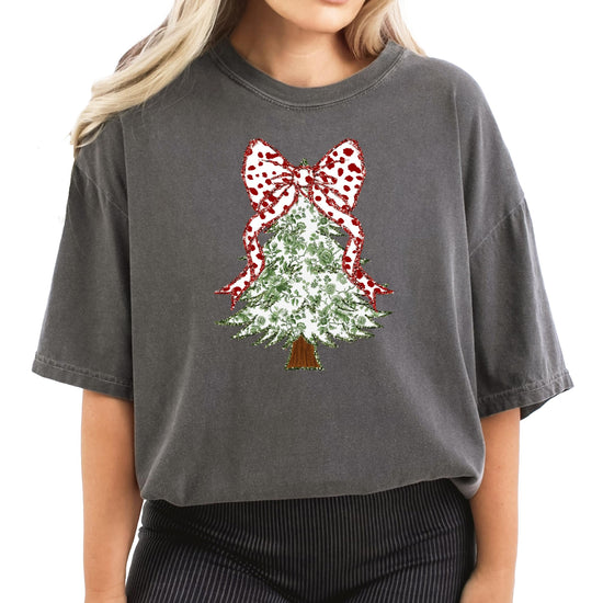 Side view of women's festive Christmas tee with floral glitter tree design in pepper colorway