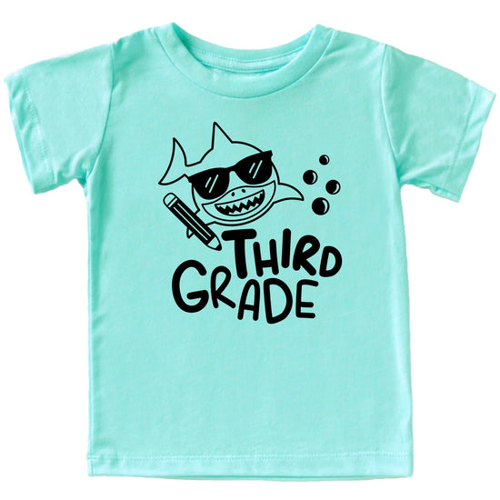 Front view of kids shark themed 3rd grade first day of school tee