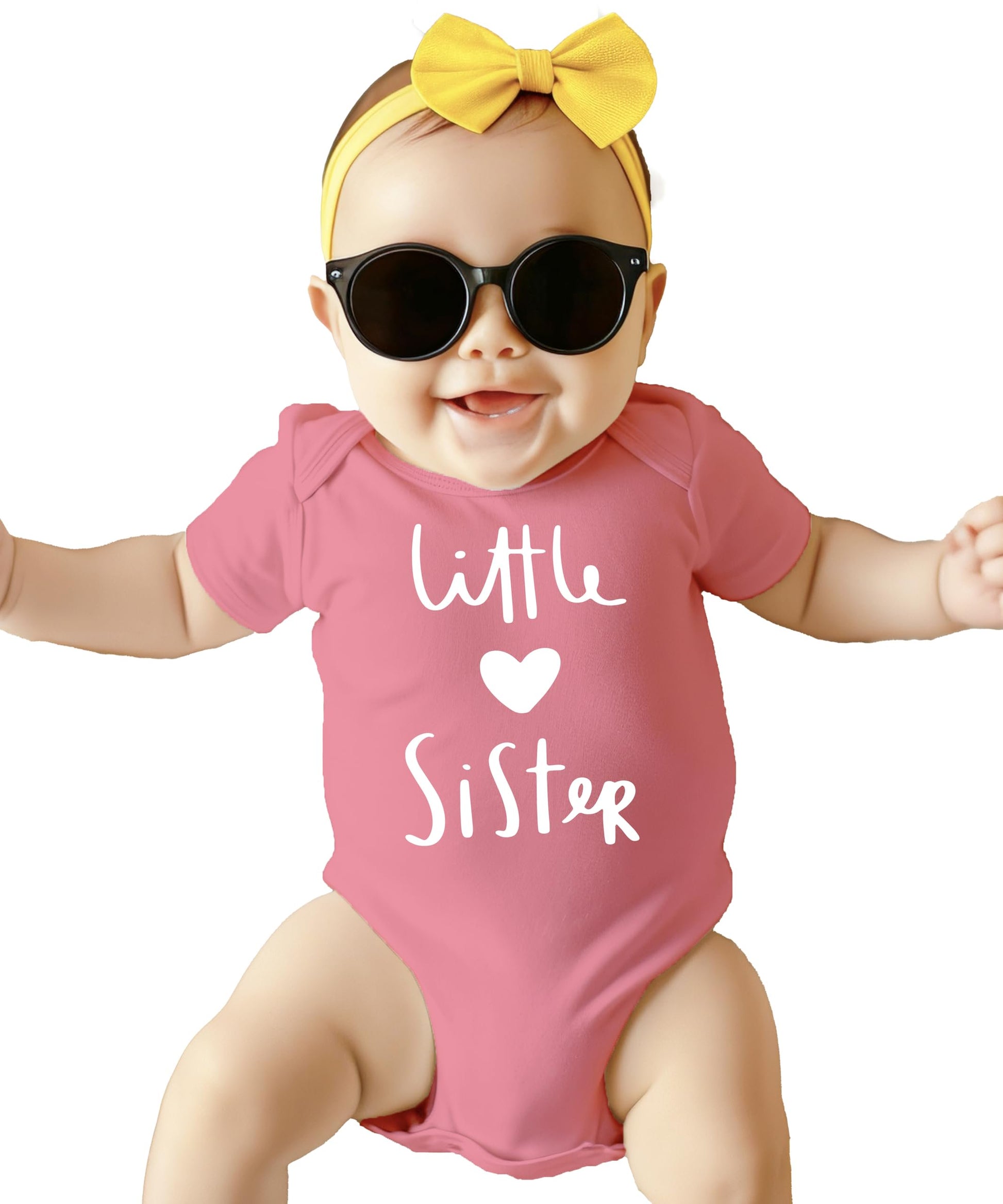 Baby girl wearing Little Sister heart bodysuit, ideal for sibling announcement photos