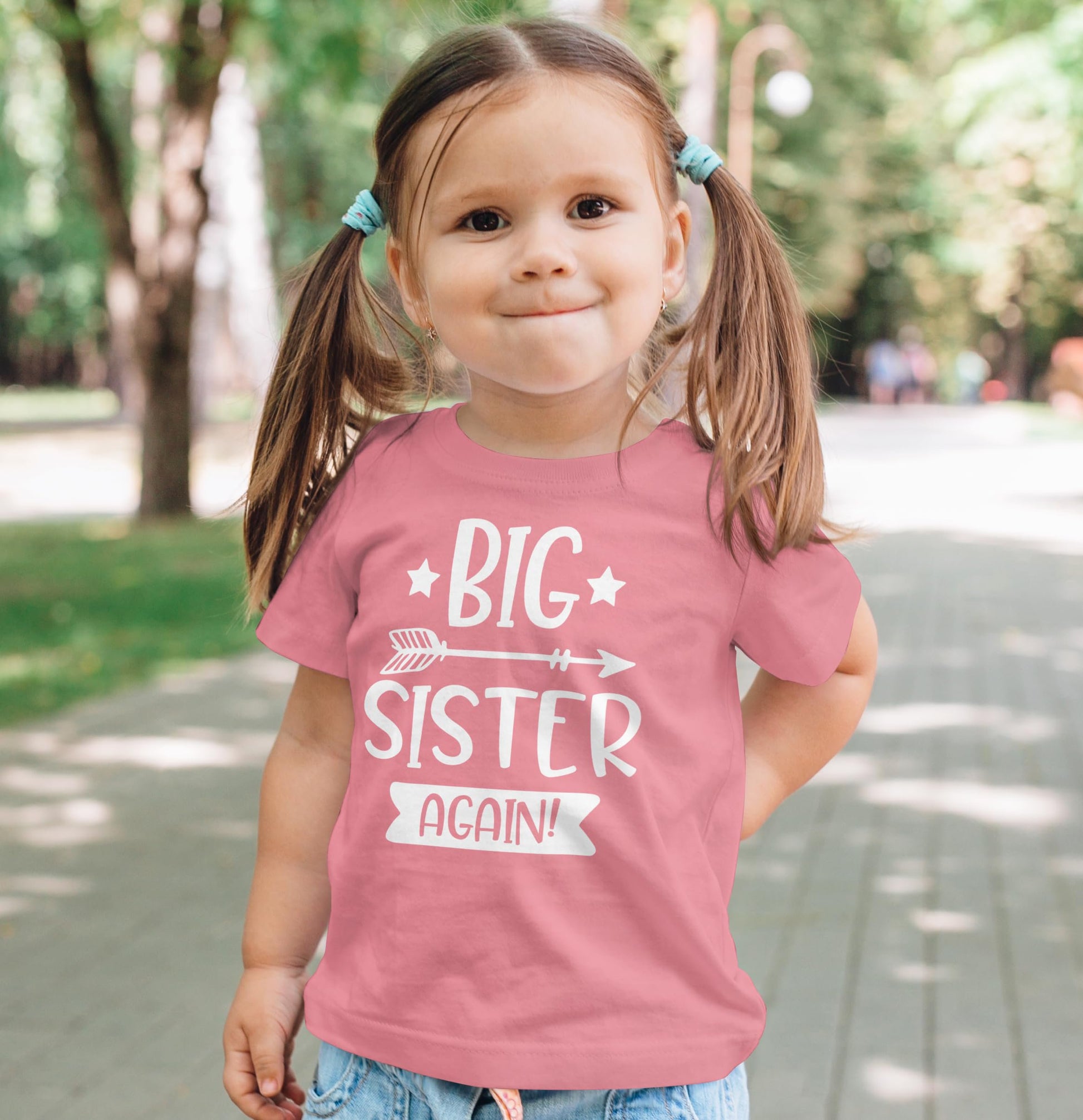 Big Sister Again arrow graphic shirt detail on mauve baby and toddler girl tee