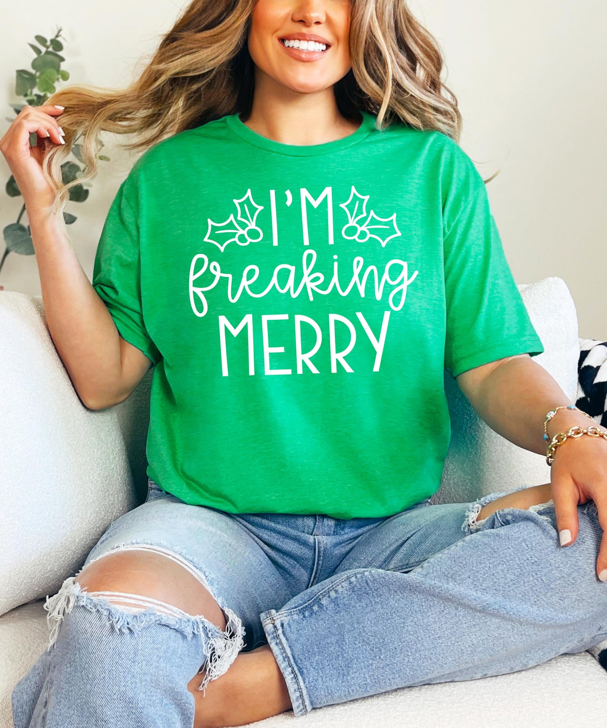 Model wearing sarcastic I'm Freaking Merry Christmas tee — perfect holiday party outfit