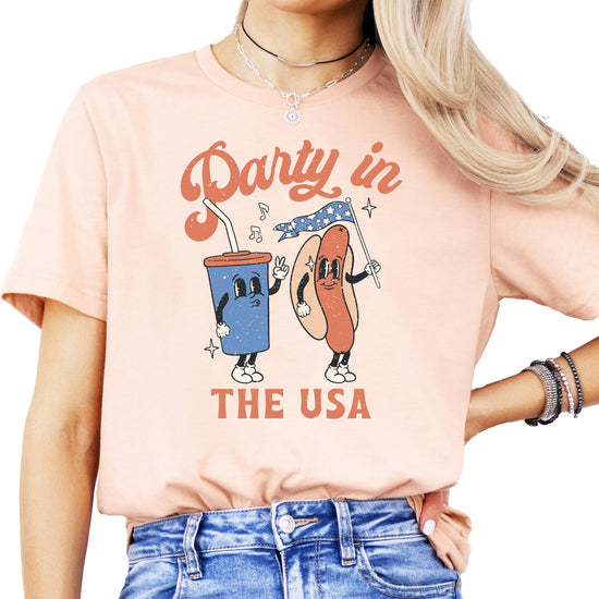 Pink toddler size Party in the USA hotdog shirt showing size and fit