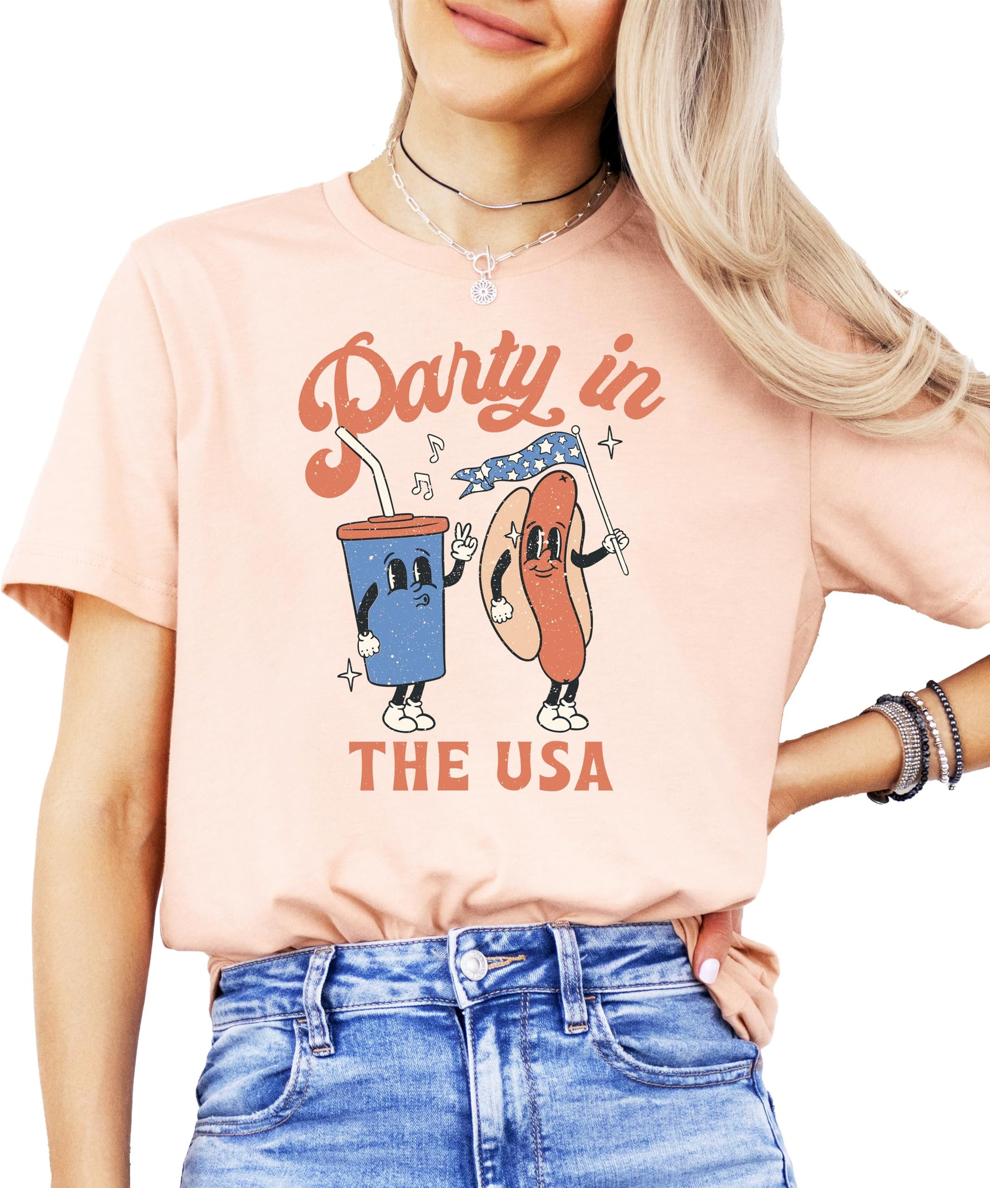 Pink toddler size Party in the USA hotdog shirt showing size and fit