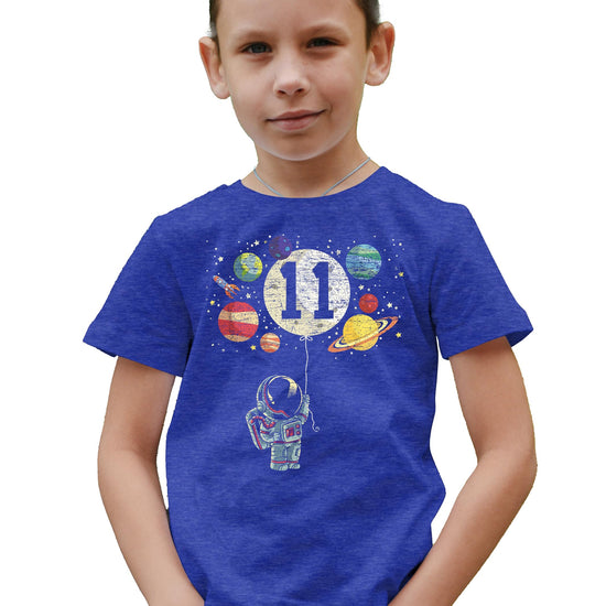 Kids space-themed 11th birthday shirt with astronaut, rocket, moon balloon, and planets graphic