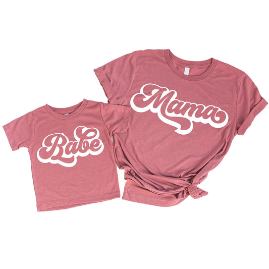 Close-up of retro graphic print on mommy and me white matching shirt